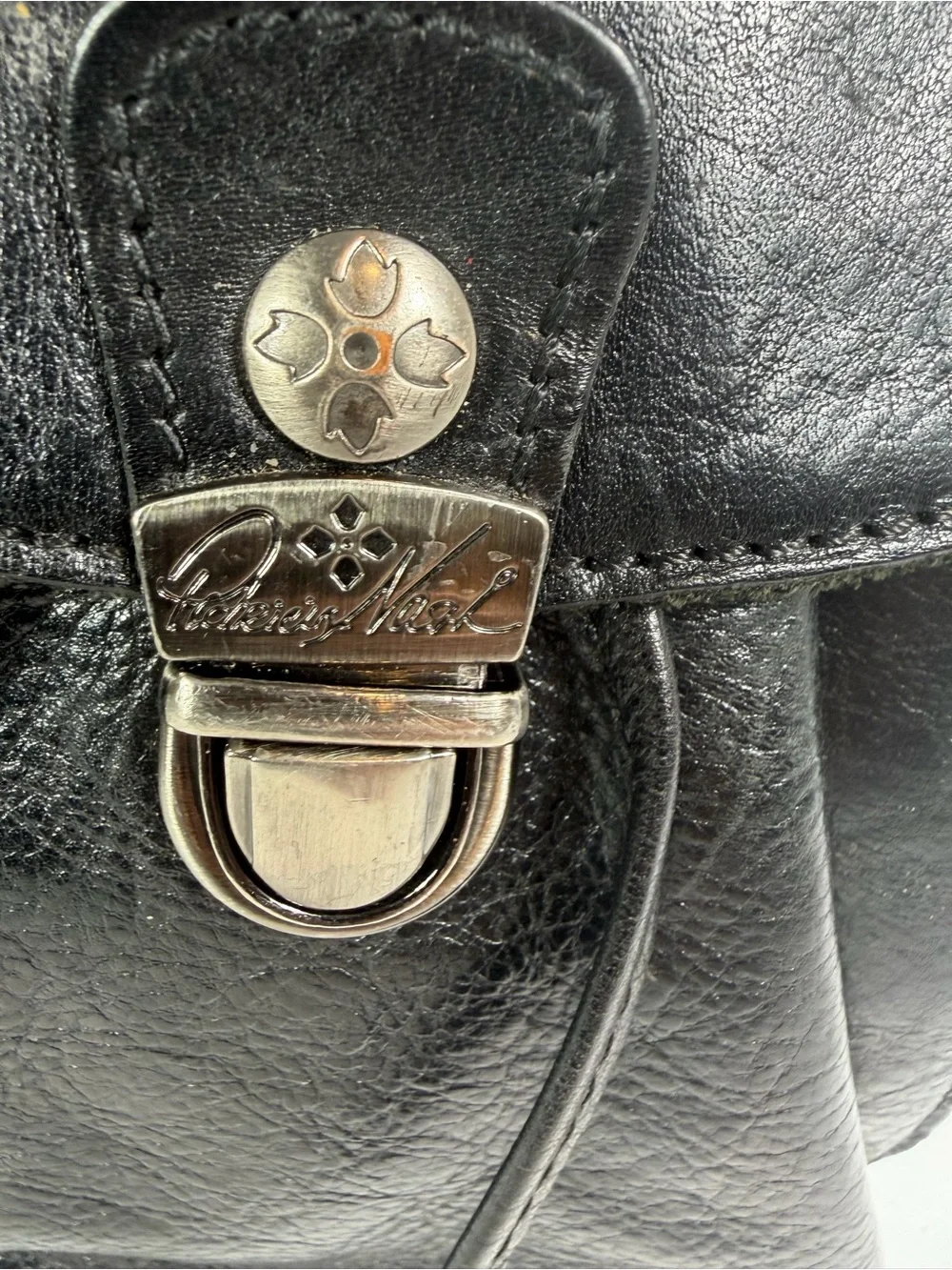 Patrica Nash black leather drawstring backpack